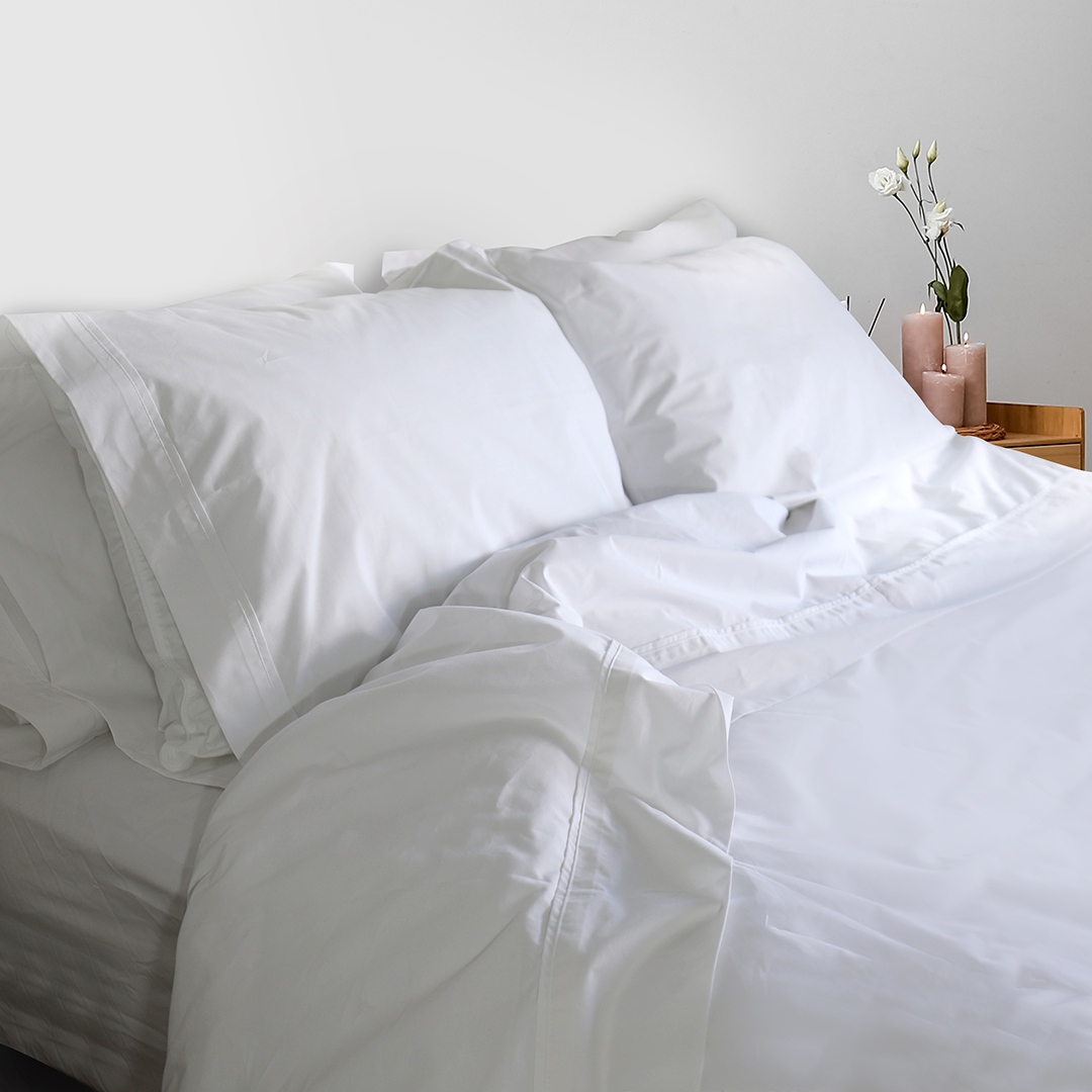 SleepFROG-organic cotton white sheet set in room with candles