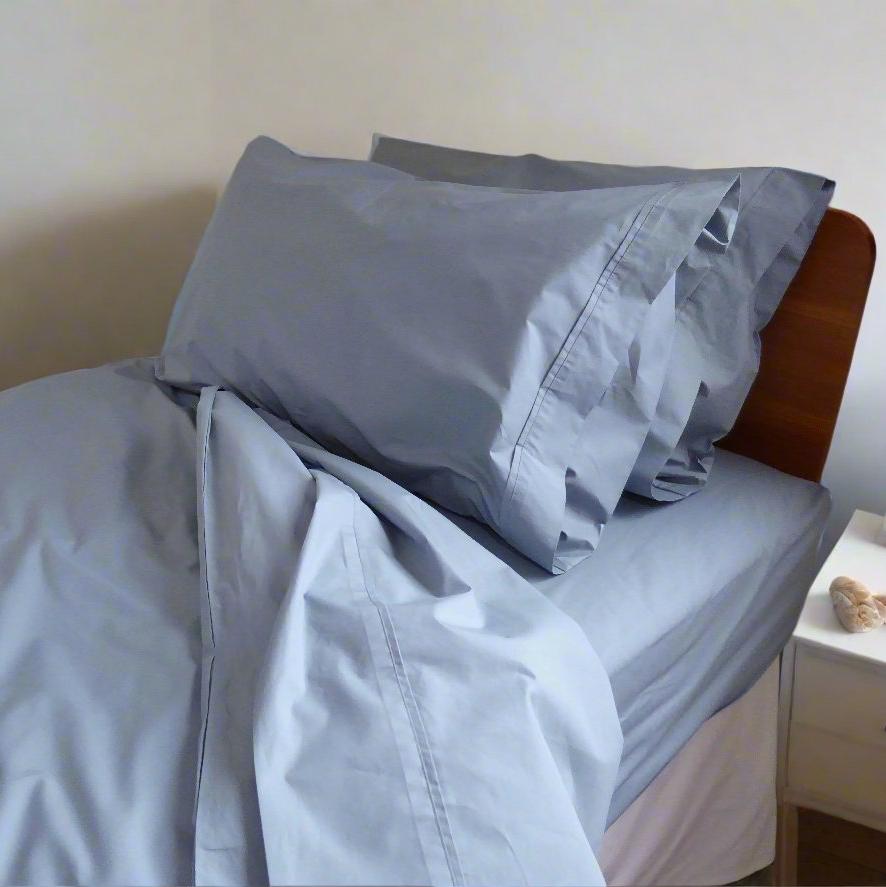 SleepFROG blue fitted sheet, in set and duvet cover on single bed 