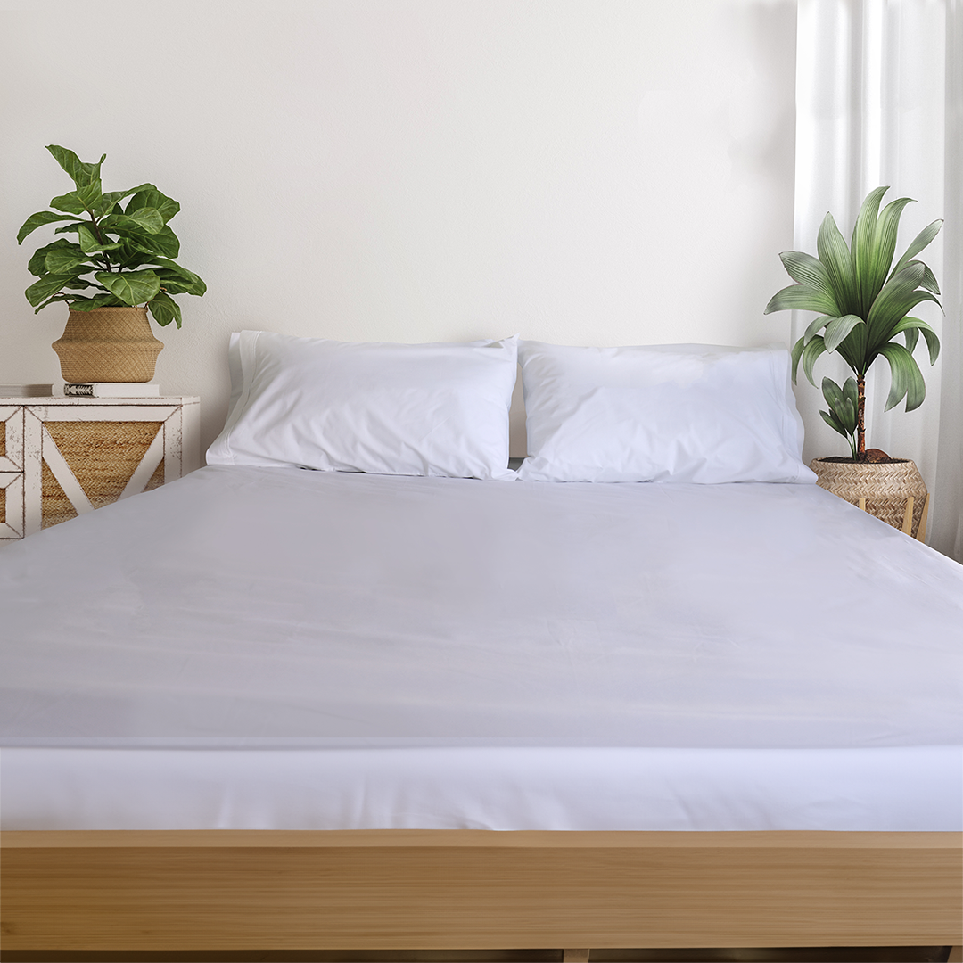 SleepFROG-white-fitted-sheet-on bed-with-pot-plants-in-neutral-background